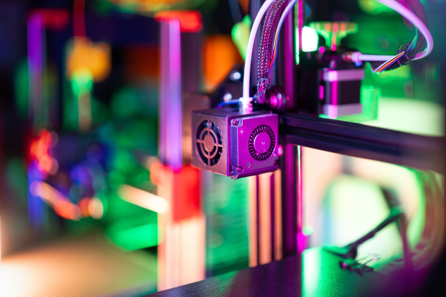 Close view of a filament printer frame and print head