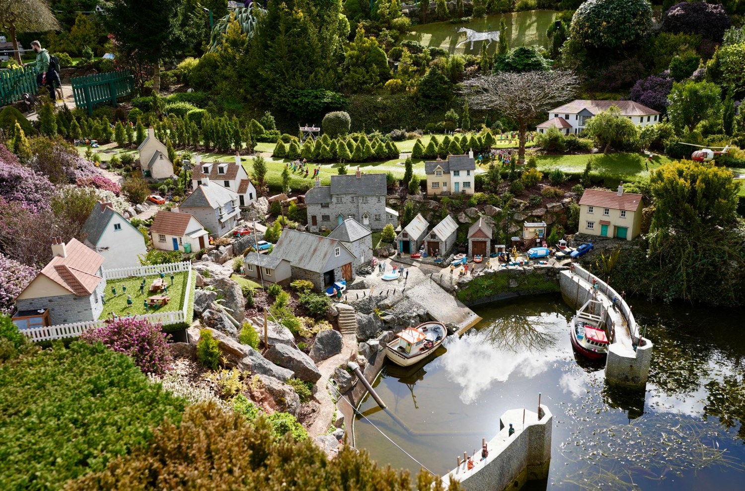 Miniature village with connecting paths and waterfront buildings